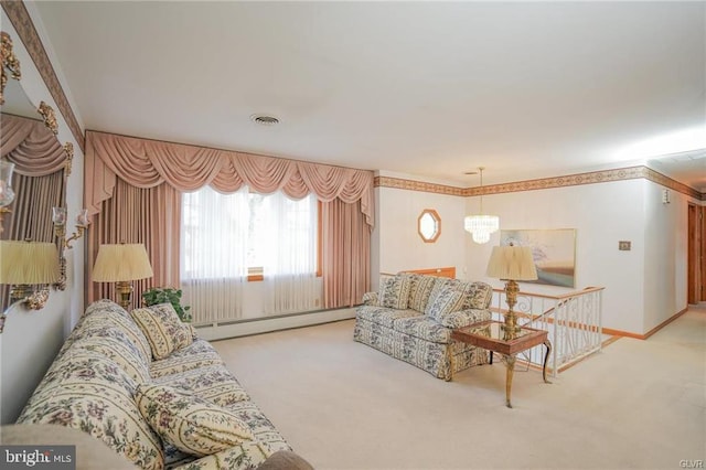 carpeted living room featuring a notable chandelier, a baseboard heating unit, visible vents, baseboards, and crown molding