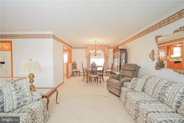 living room featuring a chandelier, crown molding, and light colored carpet