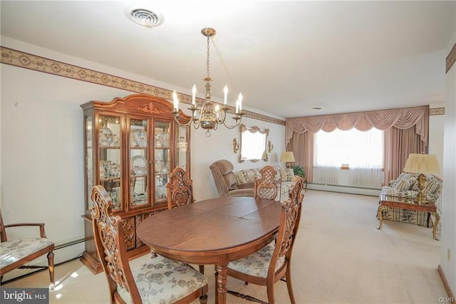 dining space featuring light colored carpet, visible vents, baseboard heating, and an inviting chandelier