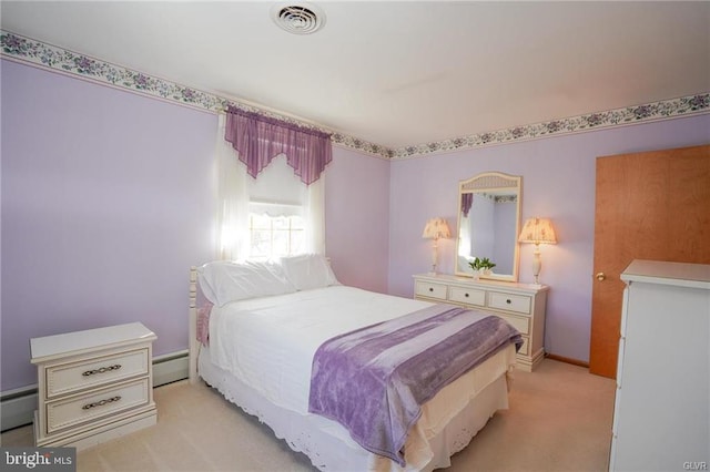 bedroom with baseboards, baseboard heating, visible vents, and light colored carpet