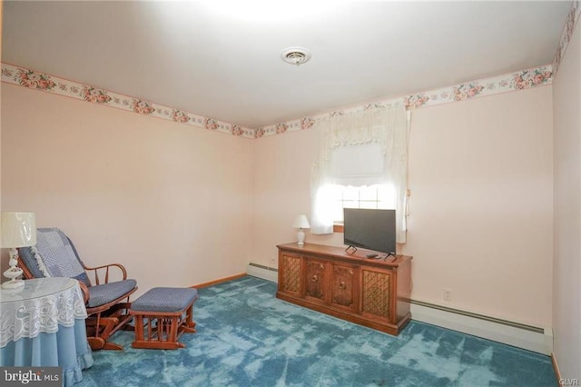 sitting room with carpet floors, baseboards, visible vents, and baseboard heating