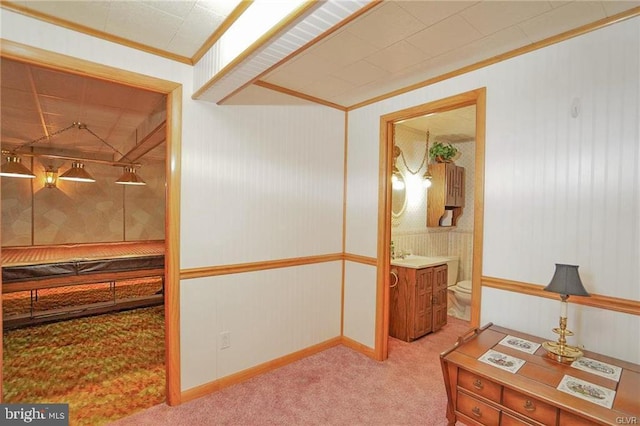 home office with ornamental molding, carpet, and baseboards