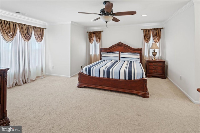 bedroom with ceiling fan, baseboards, carpet, and ornamental molding