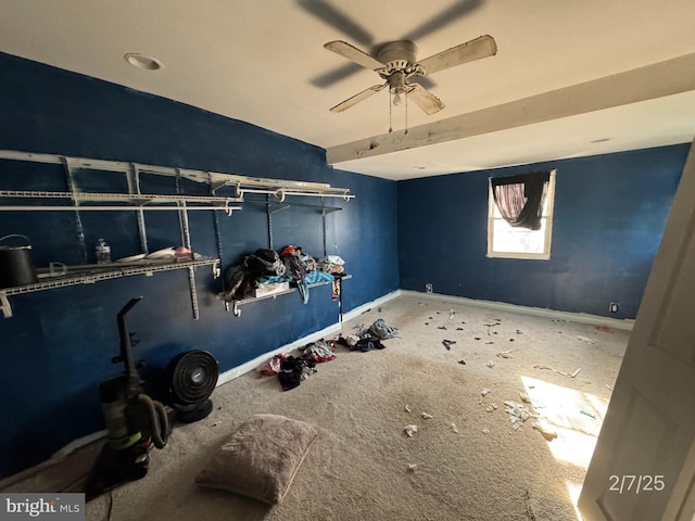 unfurnished bedroom with carpet floors, ceiling fan, and baseboards