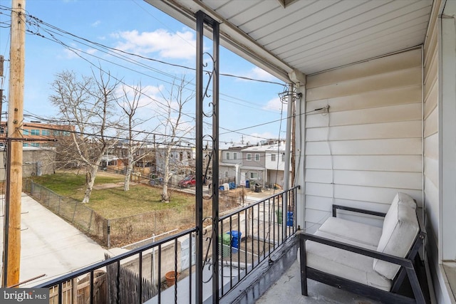 balcony featuring a residential view