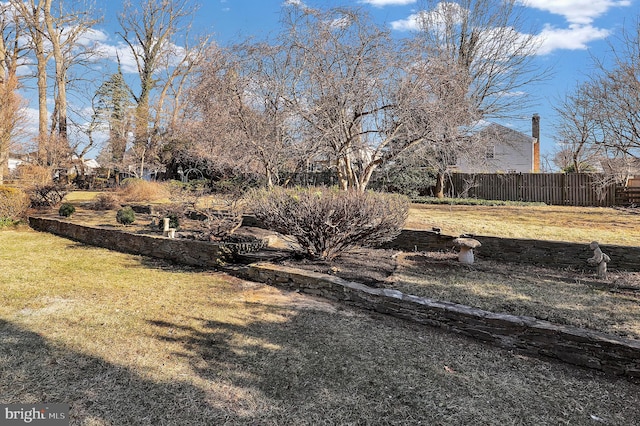 view of yard with fence