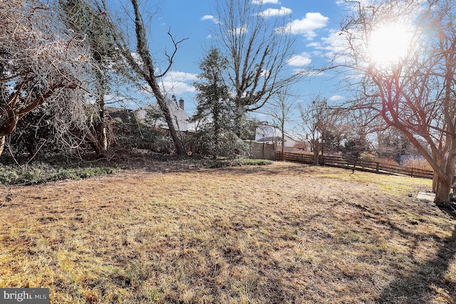 view of yard with fence