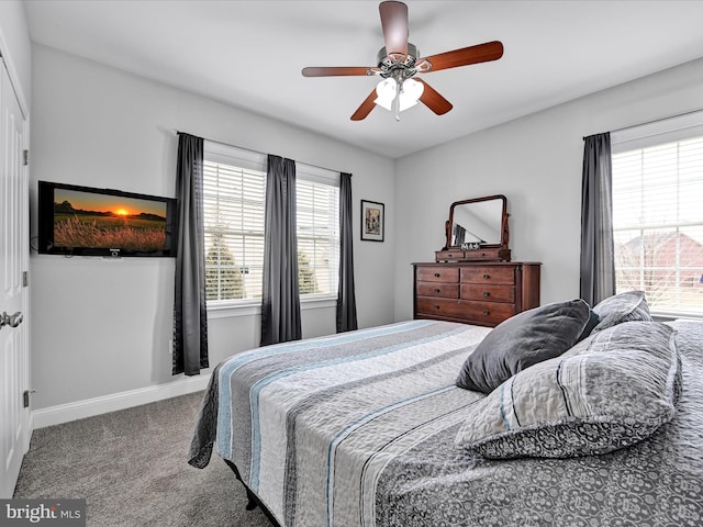 bedroom featuring carpet floors, ceiling fan, and baseboards