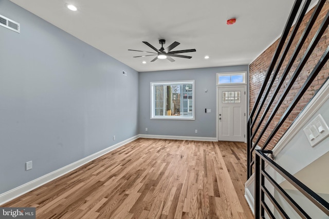 foyer with baseboards, visible vents, ceiling fan, light wood-style floors, and recessed lighting