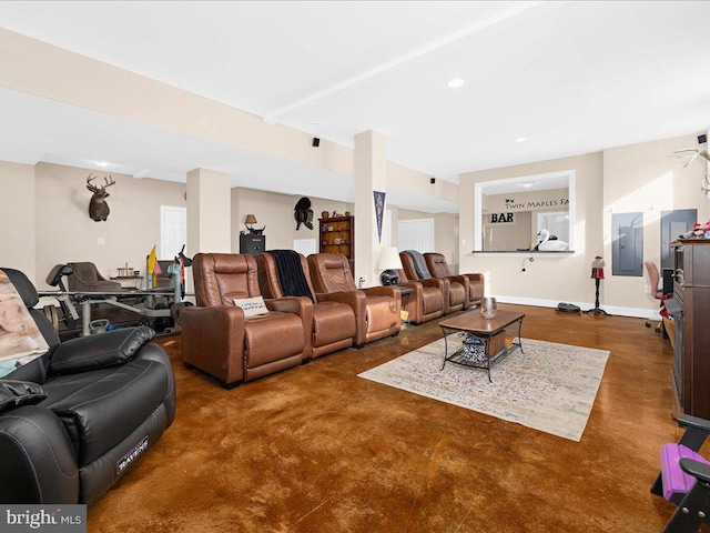 living room with baseboards and recessed lighting