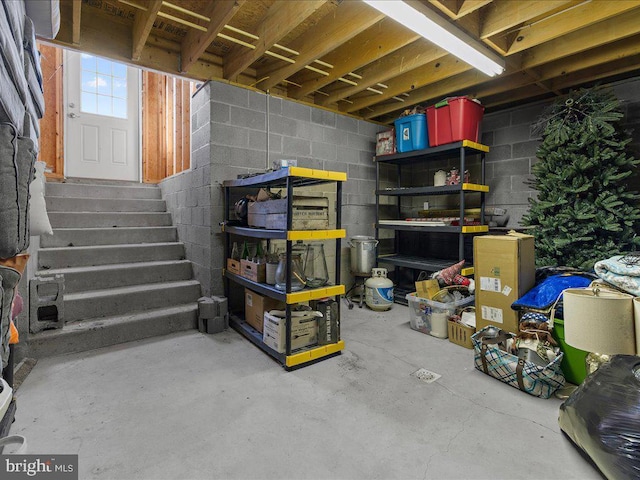 basement featuring stairway