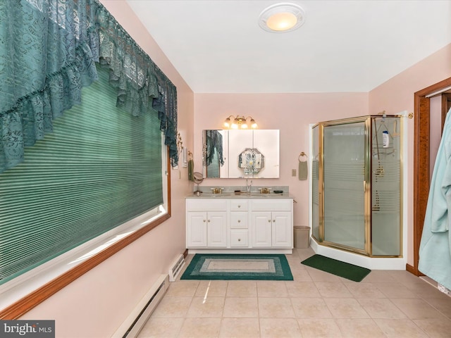 bathroom featuring a stall shower, baseboards, and tile patterned floors