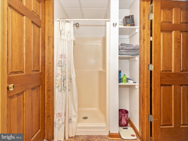 full bath featuring a shower stall