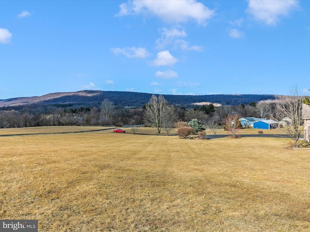 property view of mountains with a rural view