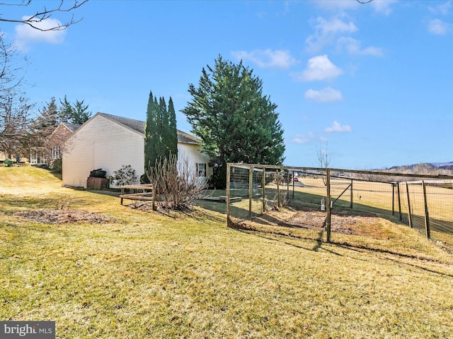 view of yard featuring fence