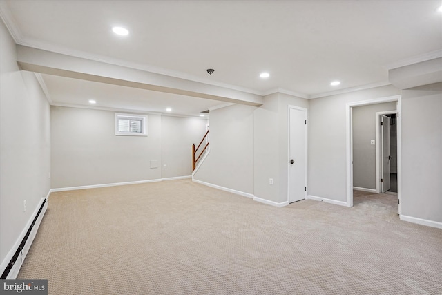 below grade area featuring recessed lighting, stairs, a baseboard heating unit, and ornamental molding