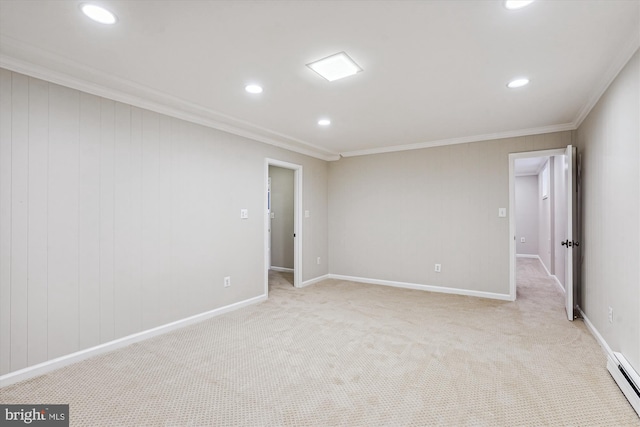 spare room featuring crown molding, light carpet, recessed lighting, and a baseboard radiator