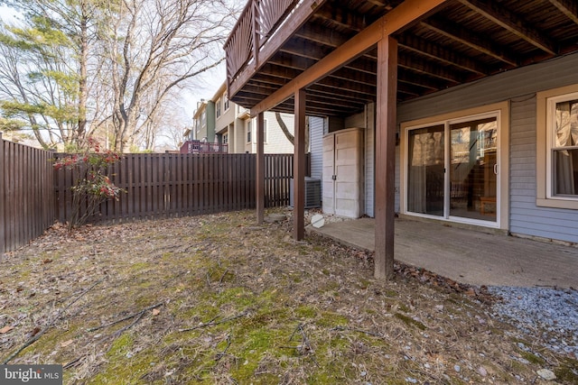 view of yard featuring a patio area and a fenced backyard