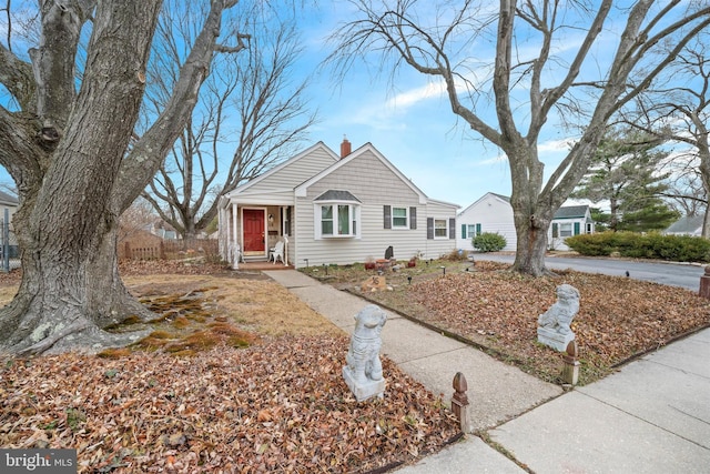 view of front of house with a chimney