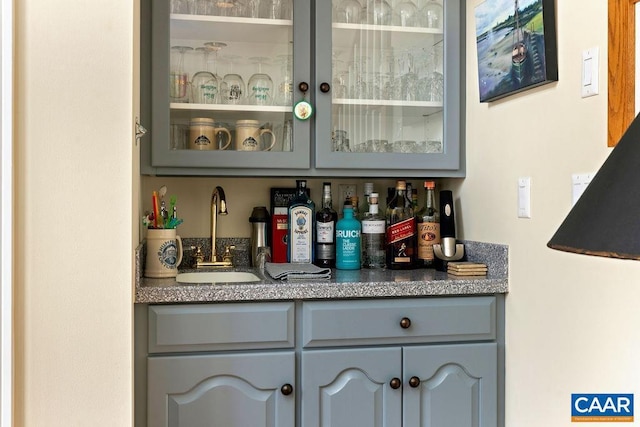 bar with a sink and bar area