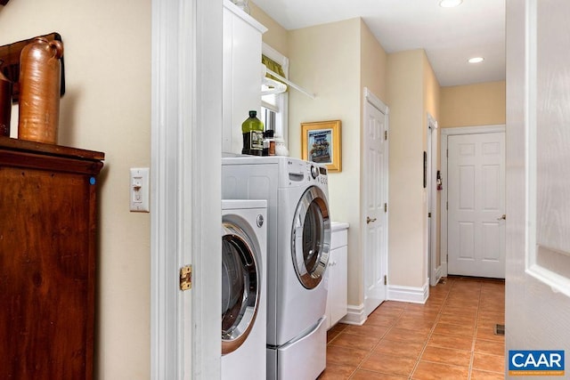 washroom featuring baseboards, light tile patterned flooring, cabinet space, recessed lighting, and washing machine and dryer