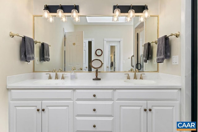 full bath featuring a sink and double vanity