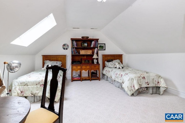 bedroom featuring visible vents, lofted ceiling with skylight, and carpet flooring