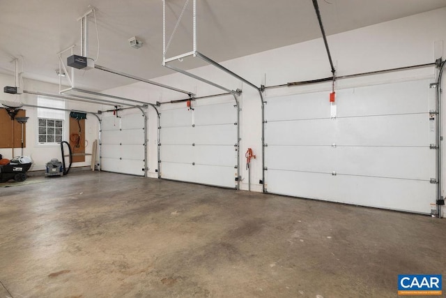 garage featuring a garage door opener