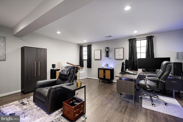 home office featuring baseboards, visible vents, wood finished floors, and recessed lighting