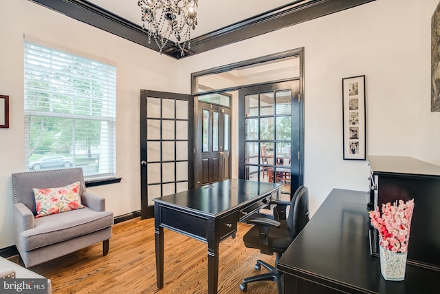 6735 Eckert Ct, Warrenton, VA 20187 - home office featuring wood finished floors, a chandelier, and plenty of natural light