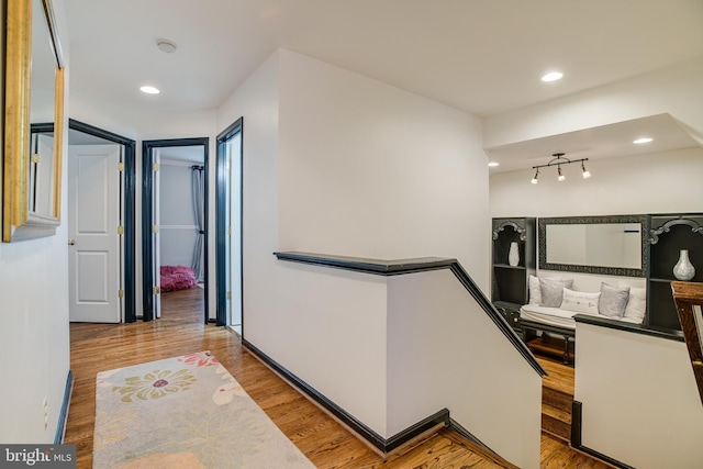 6735 Eckert Ct, Warrenton, VA 20187 - hallway featuring an upstairs landing, wood finished floors, and recessed lighting