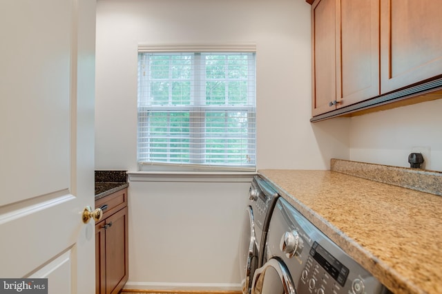 6735 Eckert Ct, Warrenton, VA 20187 - laundry area featuring separate washer and dryer and cabinet space