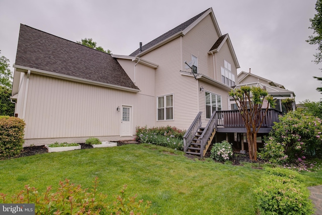 6735 Eckert Ct, Warrenton, VA 20187 - back of property with a wooden deck, a yard, stairway, and a shingled roof