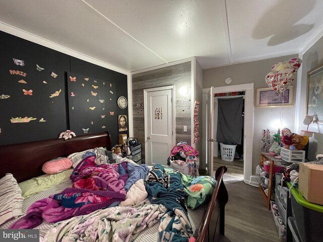 bedroom featuring wood finished floors