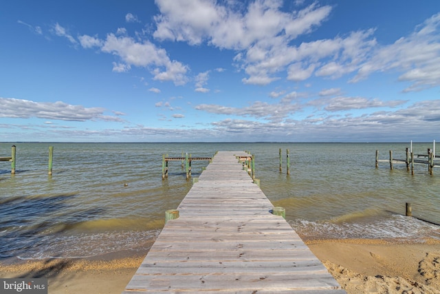 dock area featuring a water view