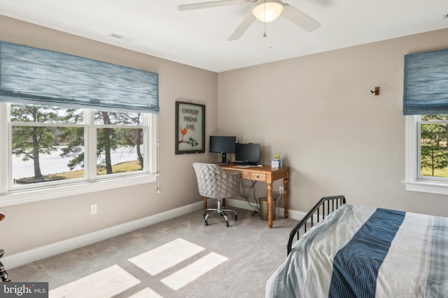 bedroom featuring a ceiling fan, carpet flooring, baseboards, and visible vents