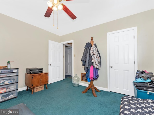 bedroom featuring a ceiling fan, baseboards, and carpet flooring