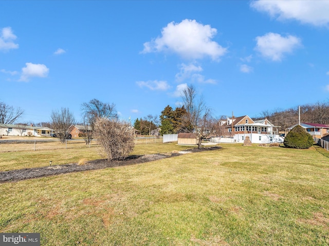 view of yard with fence