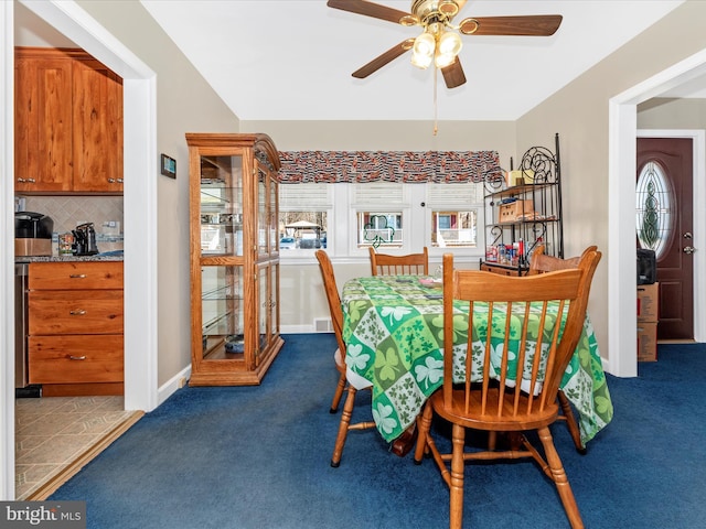 dining area featuring ceiling fan, carpet flooring, visible vents, and baseboards