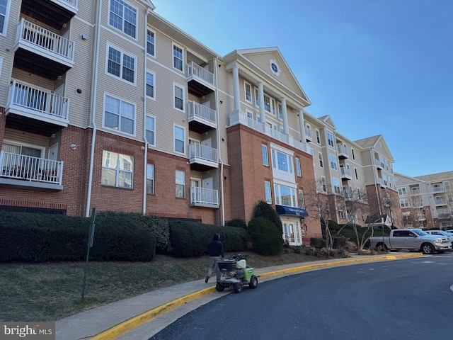 view of building exterior featuring a residential view