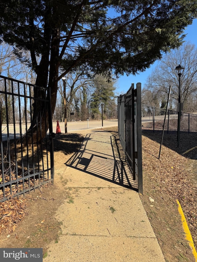 exterior space featuring a gate and fence