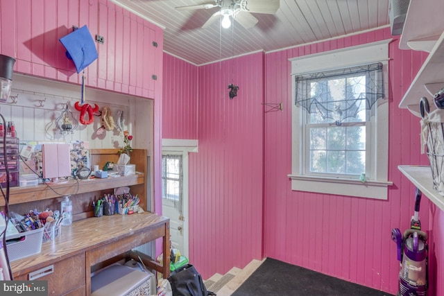 interior space featuring a ceiling fan