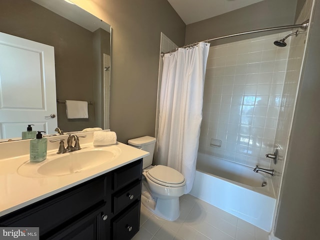 full bath with tile patterned flooring, shower / tub combo with curtain, vanity, and toilet