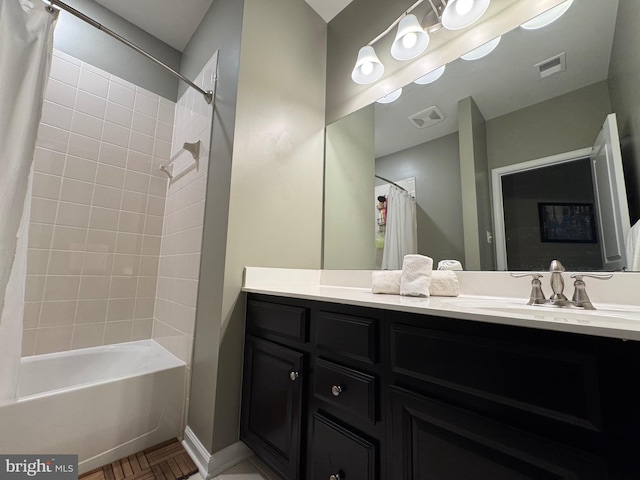 full bath with shower / bathtub combination with curtain, visible vents, baseboards, and vanity