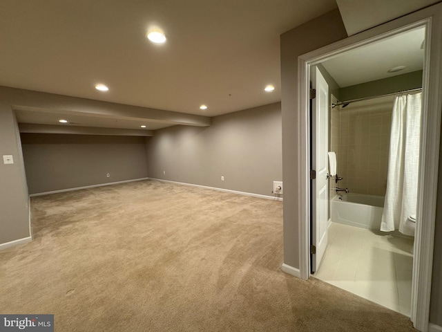 finished basement with recessed lighting, carpet flooring, and baseboards