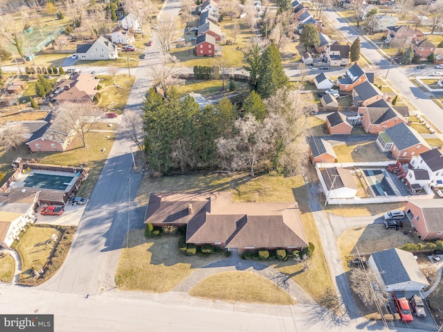 birds eye view of property with a residential view