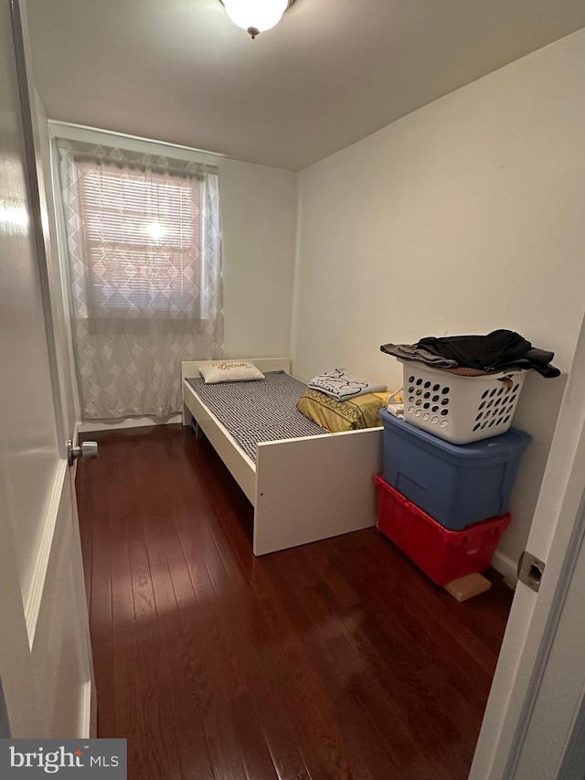 unfurnished bedroom featuring wood-type flooring