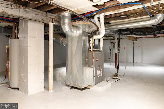 unfinished basement with water heater and heating unit