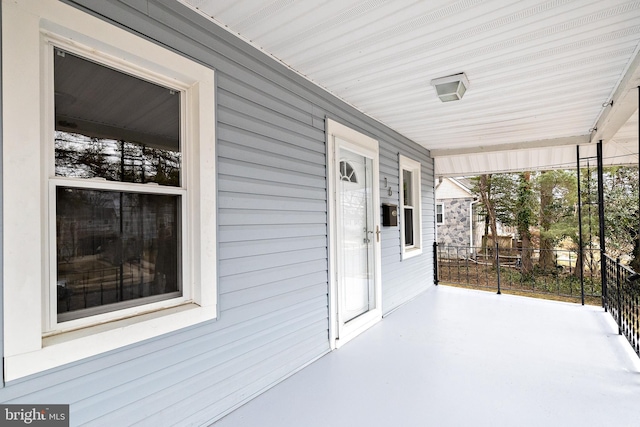 view of patio featuring a porch