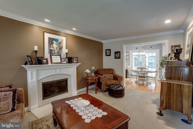 carpeted living area with ornamental molding, recessed lighting, and a premium fireplace